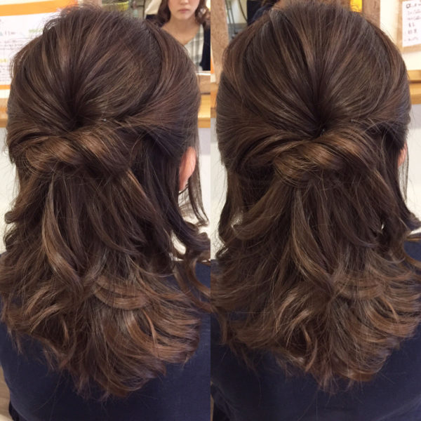 こちらはヘアアレンジ。ハーフアップにヘアアイロンを使った模様。ねじって留めて、後姿がとてもエレガントに見えますね。